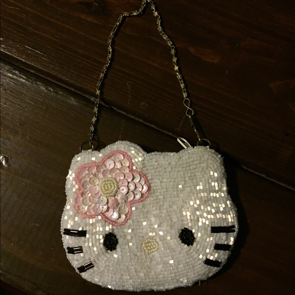 • $4 for $20 • Hello Kitty Beaded Clutch